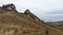 grassy ridge with rock outcrops