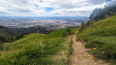 narrow trail above city